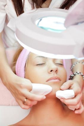 A lady having a facial treatment